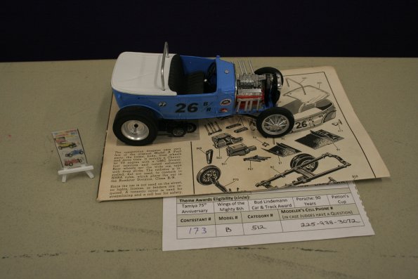 173b